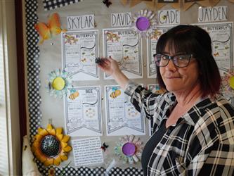 Teacher showing projects