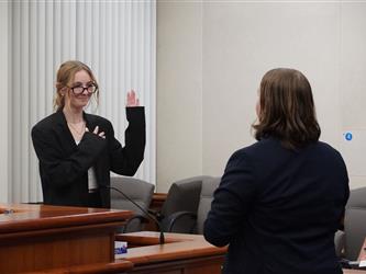 student taking oath