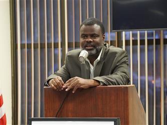man at podium