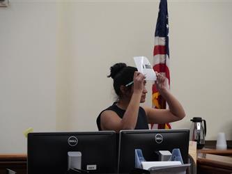 student holding paper