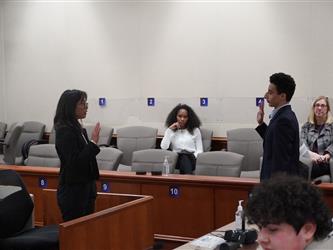 student taking oath