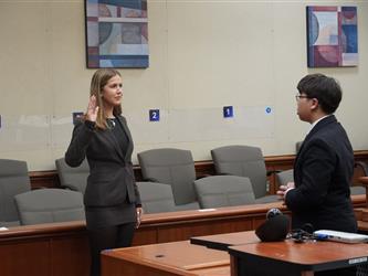 student taking oath